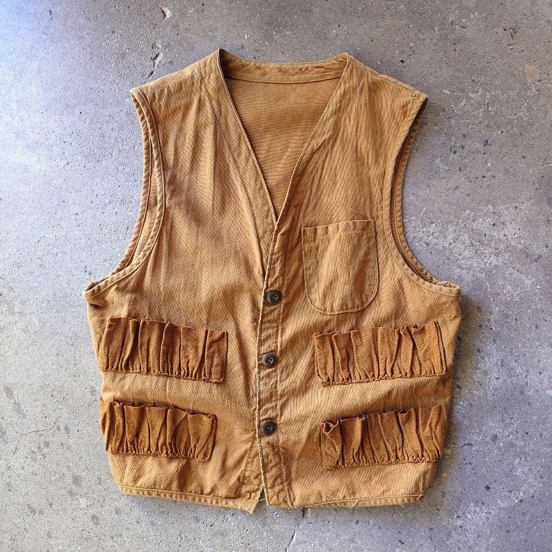 old hunting canvas vest