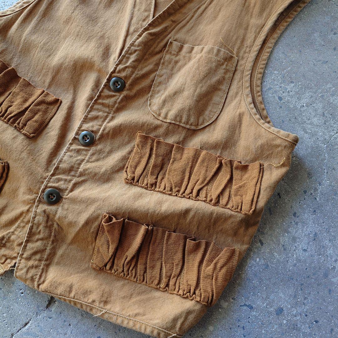 old hunting canvas vest