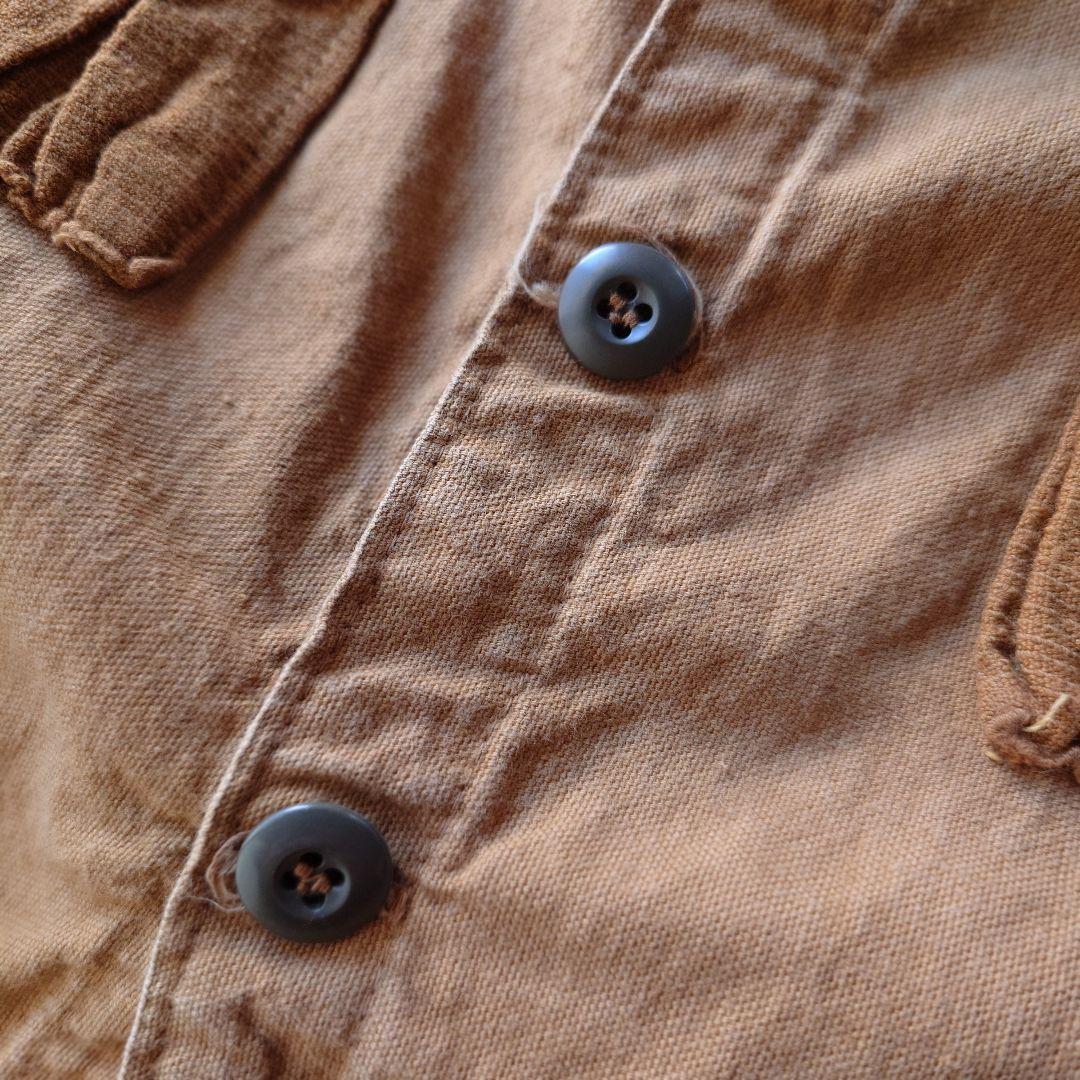 old hunting canvas vest